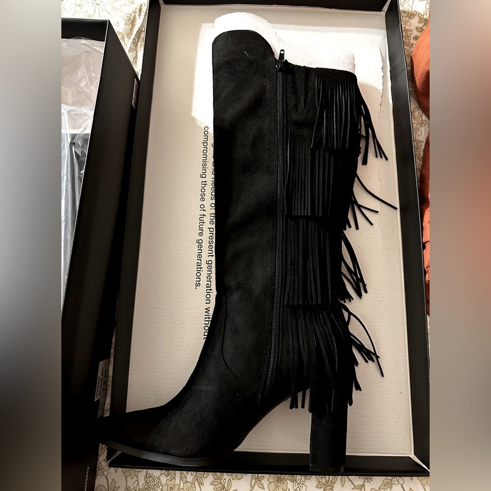 Suede fringe knee high boot in black